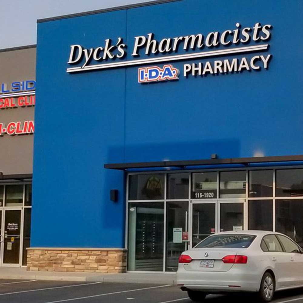 Blue exterior building of Dyck's Pharmacy store